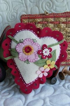 Show details for Lacey Heart Pin Cushion Sachet Felt Hearts Crafts, Bird Brain Designs, Valentines Bricolage, Bird Brain, Wool Applique Patterns, Felted Wool Crafts, Penny Rug, Fabric Hearts, Felt Embroidery