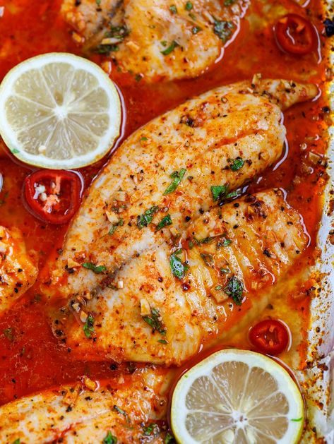 Spicy Lemon Baked Tilapia Recipe - Cookin' with Mima Tilapia Marinade, Tilapia Sauce, Tilapia Recipes Healthy, Healthy Tilapia, Lemon Tilapia, Baked Tilapia Recipes, Tilapia Recipe, Baked Tilapia, Delicious Seafood Recipes