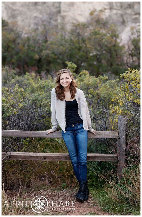 Garden of the Gods Senior Pictures During Fall in Colorado Blondish Brown Hair, Fall In Colorado, Yearbook Photo, High School Senior Photos, Rustic Fence, High School Seniors Photos, Garden Of The Gods, High School Yearbook, Yearbook Photos