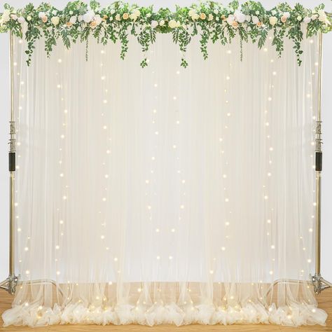 PRICES MAY VARY. Package: Includes 2 panels 5ft width by 10ft height tulle backdrop curtains, a set of 9.8ft warm white lights string and 12 pcs transparent clips. Easy to Install: The sheer tulle curtain has a 4-inch rod pocket at the top for easy hanging. Light strings can be hung with transparent clips to prevent tangles.It can be used on both sides. Elegant Sheer Draping Fabric: The backdrop curtain are crafted from soft and smooth tulle. Flowing loosely onto the floor, add a very soft, beau Tulle Backdrop With Lights, Backdrop With Drapes, Drapes For Party, Pavilion Wedding Decorations, Backdrop With Lights, Wedding Curtains, Bridal Shower Photo Booth, Lights For Party, Tulle Backdrop