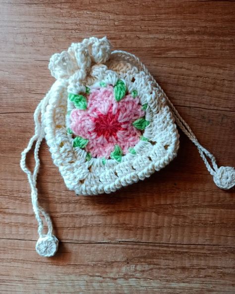 Sakura Granny Square Pouch . . . #crochetersofinstagram #sakura #crochetsakura #crochetsakuraflower #crochetkawaii #drawstringbag #crochetairpodscase #airpodpouch #crochetpouch #crochetapplique #grannysquare #grannysquaresrock #stopmotionanimation #sakuragrannysquare #india #indiasmallbusiness #indiacraftingmemories #indiahandicrafts #handmadeindia #handmadewithlove #handmadegifts #pinterestinspired #rainbowdustcrochetry #smallbuisnesscommunity #smallbusinessindia #indiacrochetclub #punesm... Granny Square Pouch, Flower Granny Square, Crochet Pouch, Sakura Flower, Crochet Square, Crochet Applique, Stop Motion, Crochet Flowers, Granny Square