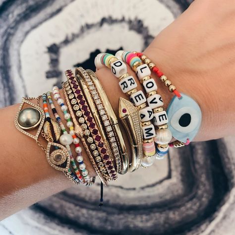 Milestones by Ashleigh Bergman on Instagram: “My best selling summer stretch LOVE bracelet, now avail in DREAM too! #lovetodream #lovebracelet #dream #milestonesbyab” Boho Bracelets Diy, Bead Bracelet Stack, The Word Love, Diy Jewelry Unique, Diy Bracelet Designs, Word Love, Love Bracelet, Beaded Stretch Bracelet, Love Bracelets