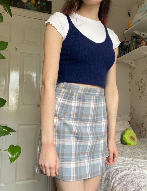 blue checkered skirt w/ blue tank top layered over a white t-shirt #90s #90sfashion #90saesthetic #blueskirt #spring2021 #springfashiontrends #aestheticoutfits Layering Tank Tops Outfits 90s, Checkered Tank Top Outfit, Tank Top Layered Over Shirt Outfit, Layer Tank Top Over Shirt Outfits, Layered Tank Top Outfits 90s, Blue Checkered Skirt Outfit, Layer Shirt Outfit, Tank Top Over Long Sleeve, Tank Top Layered Over Shirt