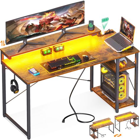 PRICES MAY VARY. Flexible Storage Shelves: To accommodate the different space layouts and placement preferences, the gaming desk with storage is designed with a reversible storage shelves. Install them on the left or right based on your preference and room setup. Plus, the middle bord of the storage rack can be adjust to two different height according to your usage needs. Multifunctional Light Strip: The led gaming desk never let you down. It comes with a RGB led strip which has 10 colors and 20 Gaming Desk With Storage, Desk With Led Lights, Gamer Desk, Desk With Shelves, Computer Desk With Shelves, Gaming Computer Desk, Kids' Desk, Gaming Desk, Desk Shelves