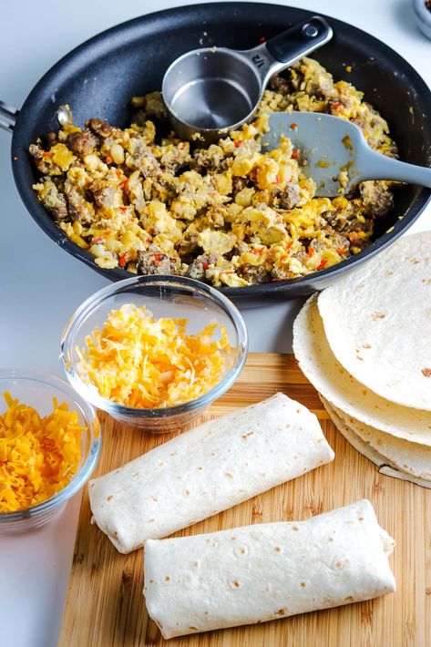 Make quick, easy, and customizable Air Fryer Breakfast Burritos! These are perfect to prepare for the week ahead and grab and go! Air Fryer Breakfast Burritos, Breakfast Burritos Frozen, Air Fryer Breakfast, Frozen Breakfast, Ground Sausage, Monterey Jack, Monterey Jack Cheese, Pork Sausage, Breakfast Burritos