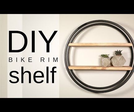 DIY Industrial Bike Rim Shelf Bicycle Rim Projects, Tire Shelf, Repurposed Tire, Diy Bicycle, Recycled Bike Parts, Modern Shelving Units, Tire Craft, Painting Teacher, Style Shelf