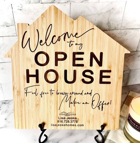 "Elevate your Real Estate marketing with a Realtor Open House Sign to add an inviting welcome for potential buyers and remind them you are ready for their offer!! Our eco-friendly bamboo 10in x 10in house shaped sign is laser engraved with the words \"Welcome to my Open House - feel free to browse around and Make an Offer!\" and includes your realtor logo  and information. Included is an 8.5 in foldable black iron stand. Please add in personalization drop down any realtor information i.e name, p Laser Realtor Gifts, Realtor Signs For Closing, Realtor Sold Sign Ideas, Real Estate Open House Food Ideas, Open House Ideas Real Estate Set Up, Realtor Supplies, Real Estate Open House Ideas, Open House Ideas Real Estate, Legacy Branding