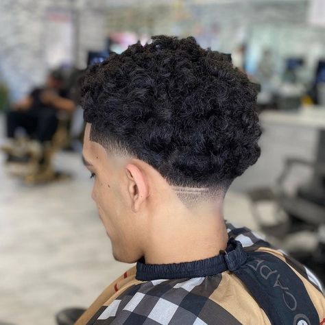 The mid taper fade haircut is perfect for those looking to look clean around the edges without feeling like no fun. Try one of these 20 trending mid taper fades. Click the article link for more photos and inspiration like this // Photo Credit: Instagram @shaunblends // #menshair #menshaircuts #midtaperfade #midtaperfadeblackmale #midtaperfadecombover #midtaperfadecurlyhair #midtaperfadehaircut #midtaperfadelonghair Mid Taper Fade Haircut Black, Mid Taper Fade, African American Haircuts, Mid Taper, Taper Fade Curly Hair, Looks For Men, Afro Fade, Curly Hair Fade, Fade Hair