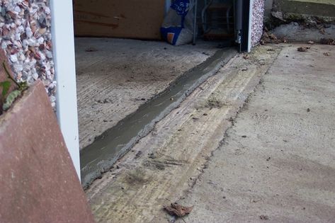 Can I create a water proof barrier to keep my garage & home from flooding? - Home Improvement Stack Exchange Diy Garage Floor, Garage Door Threshold, Concrete Garage, Flood Barrier, Garage Diy, How To Make Water, Underground Garage, Water Flood, Farmhouse Fireplace