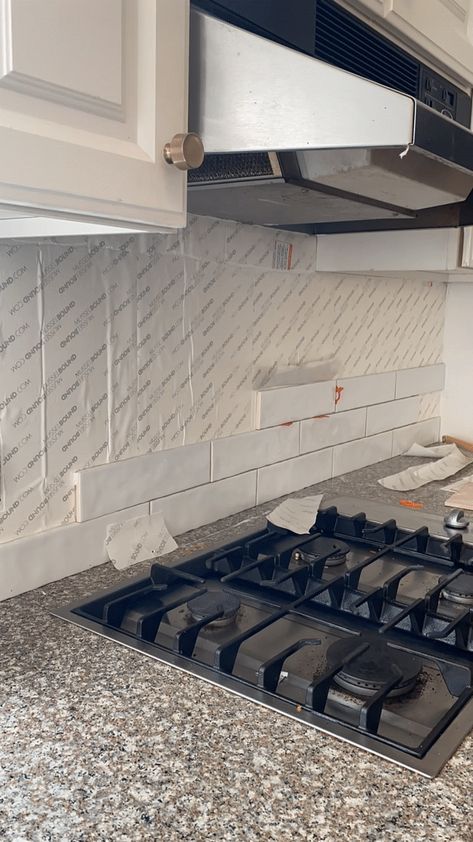 Woman installing backsplash tile with Musselbound tile adhesive. GIF of easy DIY tile installation of white subway tile in kitchen. Adhesive Tile Backsplash, White Subway Tiles Kitchen Backsplash, Easy Kitchen Backsplash, Backsplash Installation, White Subway Tile Kitchen, Install Backsplash, Easy Backsplash, Kitchen Backsplash Tile Designs, Diy Tile Backsplash