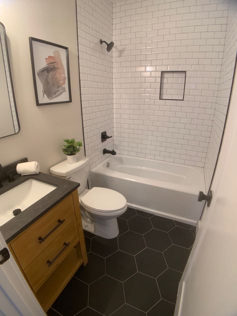 Small Bathroom Ideas Black Floor, Bathroom Black Floors, Black Hexagon Tile Bathroom White Vanity, Black Shower Floor, Coastal Ensuite, White Hexagon Tile Bathroom Floor Shower Subway On Walls, Black Hexagon Tile Bathroom Floor With Wood Vanity, Charcoal Gray Hexagon Tile Bathroom, Modern Farmhouse Bathroom Black Hexagon Tile