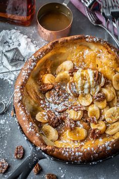 Dutch Baby Pancake Recipe, Bourbon Caramel Sauce, Bourbon Caramel, Dutch Baby Recipe, Baby Recipe, Baby Pancakes, Dutch Baby Pancake, Banana Slices, Dutch Baby