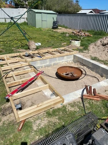 D.I.Y. sunken fire pit with seating | Bunnings Workshop community Sunken Fire Pit With Seating, Fire Pit With Seating, Sunken Fire Pit, Fire Pit Sphere, Backyard Firepit Area, Cozy Fire Pit, Sunken Patio, Sunken Fire Pits, Conversation Pit