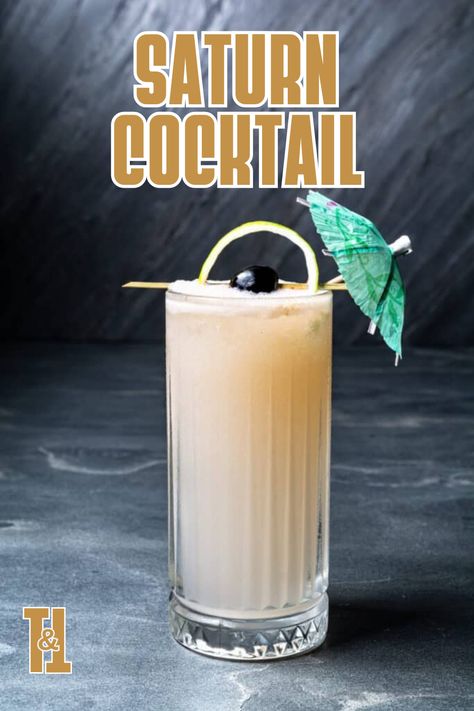 Take a cosmic journey with the Saturn Cocktail—a gin-based marvel that combines exotic flavors like passion fruit and falernum for a taste that's out of this world. Falernum Cocktail, Saturn Cocktail, Tiki Drink, Passion Fruit Syrup, Gin Lemon, Tiki Drinks, Orange Twist, Halloween Cocktails, Fall Cocktails