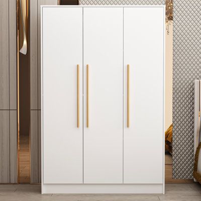 Minimize clutter while giving your abode an eye-catching focal point with this versatile wardrobe. Made from clean-lined wood, it showcases a weathered, contemporary style, while the pure white finish helps blend in with just about any colour palette. There are three doors in total, and the two doors on the left are two hangers, which are divided into two layers, which is very good for you to classify and store. There are four shelves inside a door on the right. Three Door Wardrobe Design, 3 Door Wardrobe Design, Bedroom Wardrobe Ideas, Wardrobe Storage Cabinet, Three Door Wardrobe, Almirah Designs, Wardrobe Door Designs, Wardrobe Makeover, Wardrobe Design Bedroom