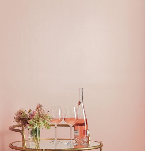 12 Paint Colors That Will Make You Happier, According to Paint Pros | Looking for a paint color with a bit more personality? You'll love this blush pink pick, called Rosé Season, that is a warm pink shade that evokes a sense of optimism and adds a joyful, happy feeling to any room. #paintcolors #realsimple #paintideas #paintcolorideas #bestpaintcolors #homeinspiration Rose Gold Wall Paint, Wall Painting Colors, Gold Painted Walls, Armoire Design, Office Paint Colors, Pink Paint Colors, Best Interior Paint, Rose Gold Painting, Painting Colors