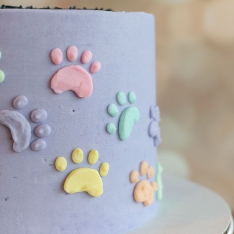 A pastel rainbow of puppy paw prints on a subtle lavender background gives this gluten-free cake the fun personality requested by the birthday girl. Paw Print Cake, Paw Print Cakes, Brooklyn Nicole, Paw Birthday, Dog Themed Parties, Lavender Background, Puppy Paw Prints, Puppy Paw, Puppy Cake