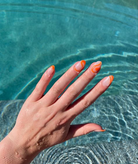 Abstract orange nail design, acrylic nails, hands in front of water Orange Wavy Nails, Orange Squiggle Nails, Nail Art Trending, Summer Nails Orange, Nails French Tips, Nails Orange, Line Nail Art, Trending Nails, Nail Drawing