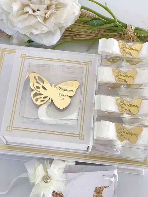 Quincenera Butterfly Fridge Magnet . #misquinceanos #sweet15 #recuerdospara #recuerdos #paraquencenera #quincenerafavors #sweet16favors #sweet15favors #butterflymagnet #butterflyfavors #personalizedgift #mısquincefavors #sweetsixteengift #acrylicmirror #tassel #ribbon #acetatebox #magnet Butterfly Themed Sweet 16, Party Favors Quinceanera, Butterfly Themed Party, Mirror Favors, Favors Quinceanera, Nikkah Wedding, Butterfly Party Favors, Sweet 16 Party Favors, Sweet 16 Favors