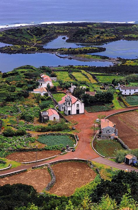 With otherworldly scenery galore, these nine picturesque Portuguese islands are not as remote as you may believe. Breathtaking scenery exemplifies the Azores, a Portuguese archipelago in the North Atlantic that’s almost 1,000 miles from Lisbon. Azorean Food, Azores Portugal, Magic Places, Visit Portugal, Unique Places, Voyage Europe, Portugal Travel, Spain And Portugal, Incredible Places