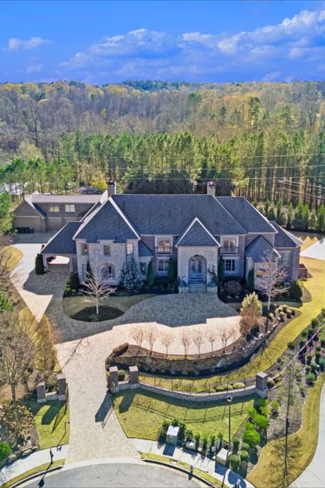 Are you a person who likes to party? This Georgia megamansion is made for you. Set to be auctioned on Sept. 1, the Alpharetta, Georgia, estate features a nearly 12,000-square-foot home full of high-end amenities, including two chef’s kitchens, an entertainment lounge, a recording studio and sauna, a game room, and a home theater. Alpharetta Georgia Homes, Entertainment Lounge, Alpharetta Georgia, Sept 1, Swim Up Bar, Georgia Homes, Custom Pool, Custom Pools, North Georgia