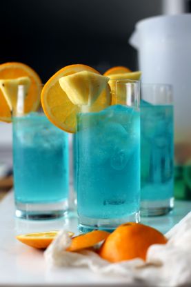 Blue Sangria, Sangria Punch, Sangria Pitcher, Pitcher Drinks, Vodka Lime, Blue Drinks, Sangria Recipe, Tipsy Bartender, Blue Cocktails