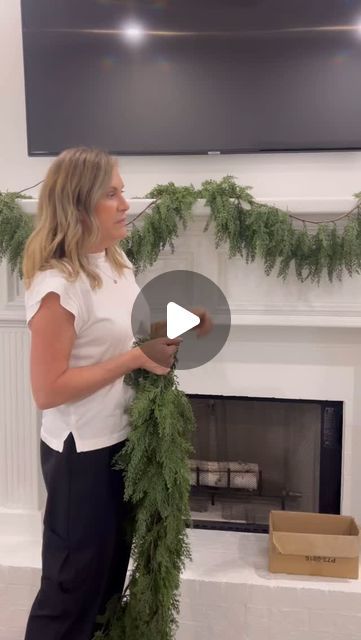 Shannon Knight Bella on Instagram: "In this video I’m showing you just one of the ways to hang garland. FOLLOW ME FOR MORE TIPS AND IDEAS! These products are from @michaelsstores  and @homegoods  and @walmart  #christmas #christmastree #christmasdecor #christmas2024 #christmasdecorations #christmasinspiration  #christmasmantle  #howto #tutorial  #garland #christmasgarland" Garland Chandelier Christmas, How To Drape Garland On Mantle, Christmas Garland Over Mirror, Garland On Mantle With Tv, Mantel Decorations For Christmas, How To Put Garland On Mantle, Christmas Garland On Fireplace, Garland On Mantle Christmas, Hanging Garland On Mantle