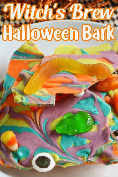 Witch's Brew Halloween Bark Halloween Brew, Halloween Bark, Halloween Witches Brew, No Bake Cherry Cheesecake, Candy Eyeballs, Candy Bark, Halloween Party Snacks, Gummy Worms, Witch's Brew