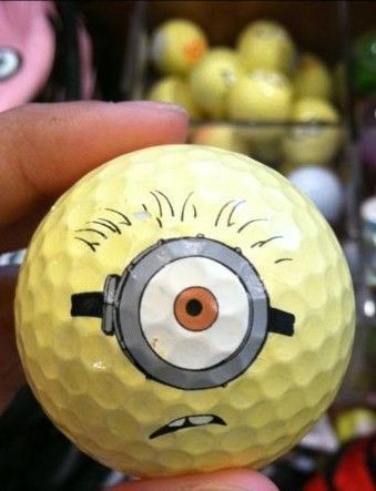 Minion Golf Ball Art (not my art) Golf Ball Art Diy, Drawing On Golf Ball Ideas, Painting Golf Balls, Golf Ball Designs Sharpie, Painted Golf Balls, Golf Ball Painting, Golf Ball Art, Golf Crafts, Ball Painting