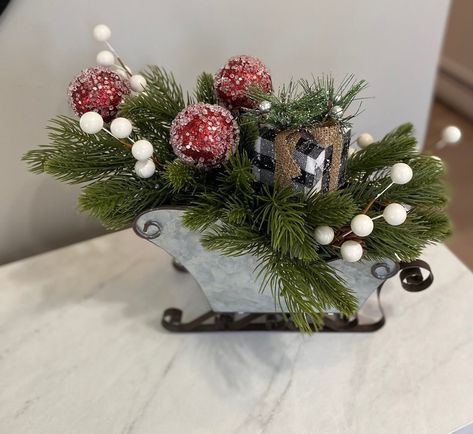 This Floral Arrangements item by JDDesignandDecor has 21 favorites from Etsy shoppers. Ships from Norton, MA. Listed on Mar 10, 2023 Santa Sleigh Centerpiece Ideas, Tabletop Sleigh Decor, Sleigh Flower Arrangement, Christmas Sleigh Arrangements, Decorated Sleighs For Christmas, Sleigh Centerpiece Christmas, Sleigh Decorating Ideas Christmas, Sleigh Decorating Ideas, Christmas Sleigh Decor