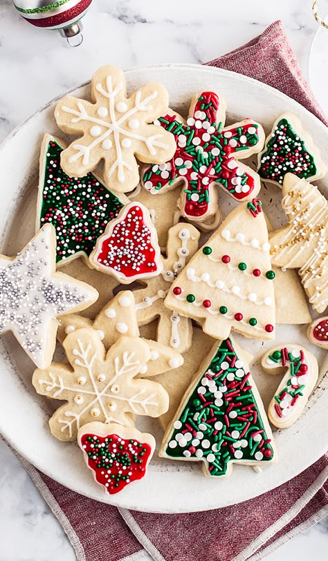 Easy Cut Out Sugar Cookies with Icing features a simple dough that’s fun to work with so you can make any festive shaped and decorated cookies you want! #christmas #cutoutcookie #sugarcookie #handletheheat #cookie #recipe Wilton Sugar Cookie Recipe, Easy Cut Out Sugar Cookies, Sugar Cookies With Icing, Easy Sugar Cookie Dough, Cookies With Icing, Cut Out Sugar Cookies, Gluten Free Christmas Cookies, Cut Out Sugar, Handle The Heat