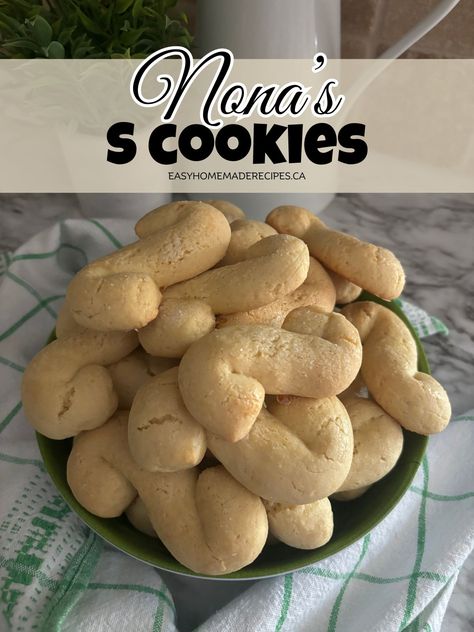 My Nona's S Cookies recipe is the perfect dunking cookie for a cup of coffee. Perfectly crisp on the outside, chewy on the inside and just the right consistency to soak up coffee without falling apart in your cup.Just as good as Nona's S Cookies are my Lemon Drop Cookies and Italian Peach Cookies that everyone raves about. Try them, they make great cookies for special occasions like bridal showers or baby showers. Italian S Cookies, Italian Peach Cookies, Dunking Cookies, Italian Anisette Cookies, Forgotten Cookies Recipe, Forgotten Cookies, Hazelnut Recipes, Peach Cookies, Lemon Drop Cookies