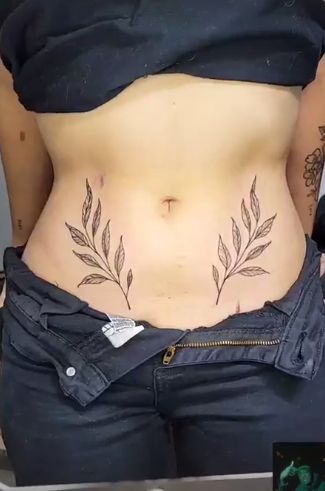 Hip Leaf Tattoos Women, Belly And Hip Tattoos, Small Belly Button Tattoos For Women, Leaves Stomach Tattoo, Leaves On Hip Tattoo, Vine Tattoos Stomach, Hip Leaf Tattoo, Leaf Stomach Tattoo, Plant Stomach Tattoo