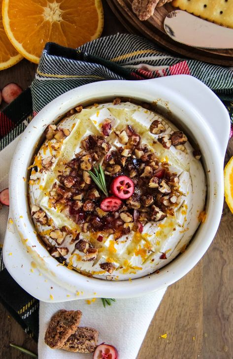 a baked brie wheel topped with cranberries, nuts, honey and orange zest Baked Brie With Fig Jam, Brie With Fig Jam, Baked Brie With Honey, Brie With Honey, Brie Wheel, Baked Brie Appetizer, Warm Appetizers, Baked Brie Recipes, Cranberry Baking