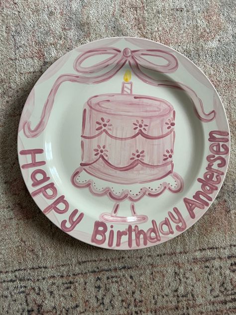 Pink Scalloped Cake Happy Birthday Plate. All our collectible plates are hand painted to order. This design can be customized with a name. Perfect for birthday parties or treats on a child's special day. Bonnets and Bows themed birthday plate How To Paint Plates, Birthday Pottery Plate, Baby Birthday Plate, First Birthday Plate, Painted Birthday Plate, Birthday Plates Ceramic, Birthday Plate Ideas, Painted Pottery Ideas, Happy Birthday Plate