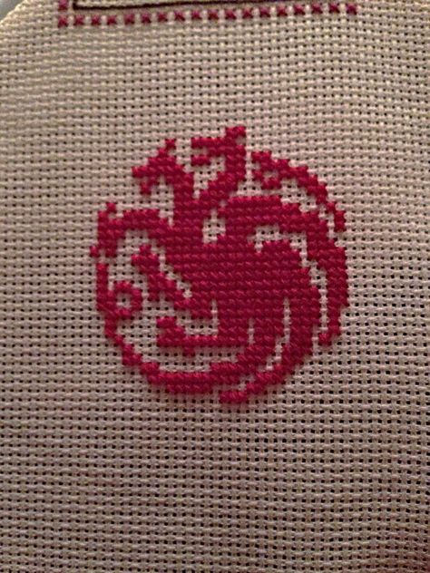 Started a new cross stitch project using Game of Thrones sigils. Finished my Targaryen dragon! #GoT Targaryen Cross Stitch, Cross Stitch Game Of Thrones, Targaryen Embroidery, Game Of Thrones Crochet, Dragon Cross Stitch Patterns, Gaming Cross Stitch, Cross Stitch Dragon, Game Of Thrones Cross Stitch, Game Of Thrones Sigils