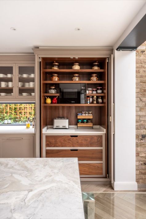 breakfast bar with bespoke pocket doors by Herringbone Kitchens, enfield London Pocket Door Larder, Kitchen Cabinet Pocket Doors, Pocket Door Pantry Kitchen, Breakfast Larder, Pantry Pocket Door, Pocket Door Pantry, Pantry Larder, Herringbone Kitchen, 25 Beautiful Homes