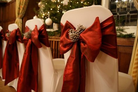 Christmas Chair Decorations Diy, Cone Decoration, Christmas Gala, Regal Wedding, White Chair Covers, Wedding Chair Sashes, Christmas Chair Covers, Christmas Video, Christmas Chair