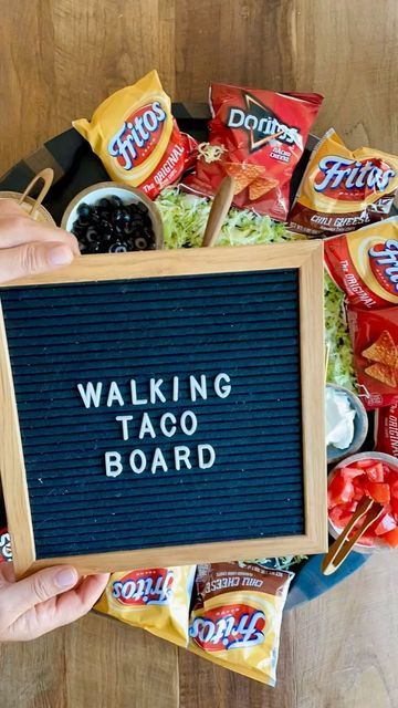 Sandy Coughlin on Instagram: "The original Walking Taco Board for this week or NYE! Grab your big board + this easy recipe. ➡️Link in bio https://reluctantentertainer.com/epic-walking-taco-board-recipe/ #reluctantentertainer #walkingtacos #walkingtacoboard #nyeparty #nye2023🥂 #tacostacostacostacos" Fall Entrees, Taco Board, Walking Taco, Walking Tacos, Big Board, Nye Party, Tex Mex, Grad Parties, Big Game