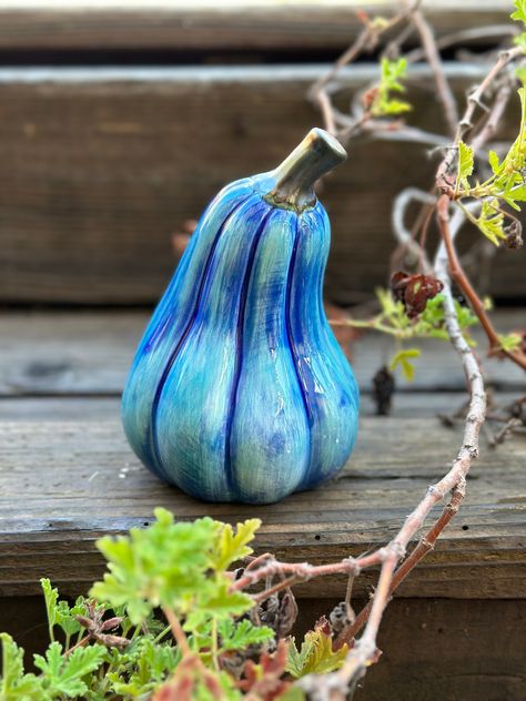 "This tall gourd is a perfect fall decoration for any porch or table! The gourd is approximately 6\" tall and 4\" wide. Each gourd is one of a kind and adds some festive spirit to the home." Pumpkin Pottery, Holiday Pottery, Tall Pumpkin, Cowgirl Party, Cement Crafts, Fall Decoration, Pink Pumpkins, Gourd Art, Hand Painted Ceramic