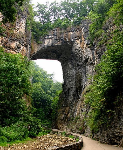 Natural Bridge, Virginia  
George Washington carved his name in stone, into the side of the bridge when he was a young soldier in the war.  Pretty neat!  The evening laser light show is moving as well. Natural Bridge Virginia, Virginia Travel, Virginia Is For Lovers, Hiking Guide, Natural Bridge, Red River, Road Trip Fun, Places Around The World, Natural Wonders