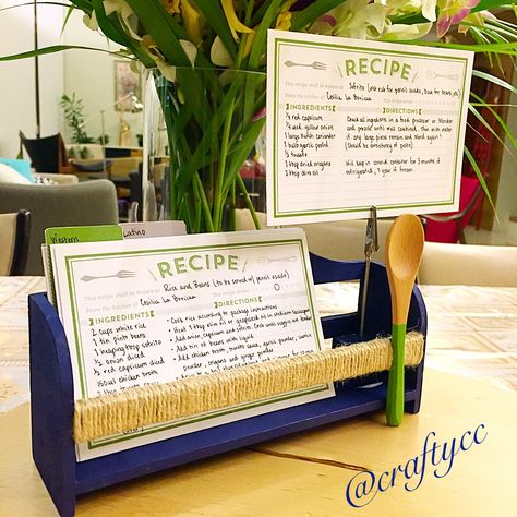 Made this recipe card stand/display from an unfinished wooden stand I found at Daiso. Matte navy acrylic paint, twine from Muji, small wooden spoon and alligator clip card holder from Daiso, and free printable recipe cards from www.lovevsdesign.com. Voilà - an attractive personalized and incredibly affordable present for a friend! Card Stand Display, Recipe Cards Printable Free, Small Wooden Spoons, Recipe Card Holders, Korea Food, Card Stand, Printable Recipe, Stand Display, Printable Recipe Cards