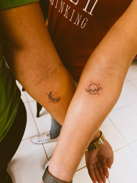 Taylor Swift Inspired Matching Tattoos, Aurora Borealis Tattoo Minimalist, Floral Saturn Tattoo, Taylor Swift Matching Tattoos For Best Friends, Mother Daughter Taylor Swift Tattoos, Salt Air Tattoo, Taylor Swift Bestie Tattoos, Taylor Swift Moon And Saturn Tattoo, Moon And Saturn Tattoo Taylor Swift Matching