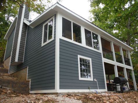 Back of house with new James Hardie Evening Blue Siding and Arctic White soffit, fascia, and trim. James Hardie Evening Blue, Hardie Board Siding Colors, Blue Vinyl Siding, Hardy Board, Modern Siding, Blue Houses, Blue Siding, Hardie Board, James Hardie Siding