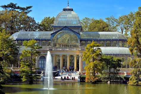 Three years after finishing Velázquez Palace, Ricardo Velázquez Bosco was the architect for the Crystal Palace. The glass, domed structure was inspired by London’s Crystal Palace. Initially, it was designed as a giant greenhouse for displaying exotic plants from the Philippines. Today, Palacio de Cristal is used by the Reina Sofia Museum for occasional exhibits. … Giant Greenhouse, Reina Sofia Museum, Retiro Park, The Crystal Palace, Dome Structure, The Architect, Crystal Palace, Exotic Plants, Madrid Spain