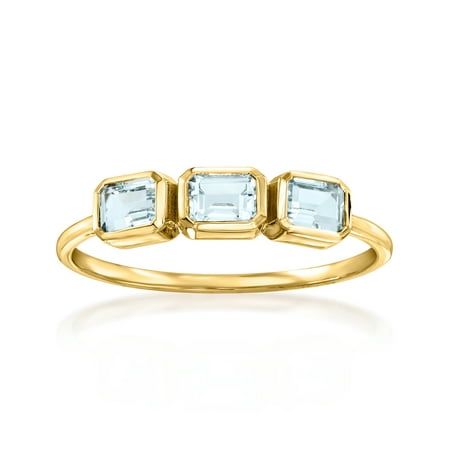 A trusted jeweler in 1952, Ross-Simons is dedicated to quality and value. RS Pure. Modern designs that complete your outfit and complement your personality. A simple take on the classic three-stone style, this dainty ring shimmers with .70 ct. t.w. emerald-cut aquamarines in glossy 14kt yellow gold. Wear it solo or stacked! 1/8" wide. Aquamarine three-stone ring. Each Ross-Simons item arrives in a fine jewelry presentation box. Shop Ross-Simons jewelry risk-free as all items include a 30-day, 100% money-back guarantee. Stone Information Gem Type 1: Aquamarine Stone Cut 1: Good-Cut Stone Color 1: Blue Stone Clarity 1: Blue Stone Shape 1: Emerald-Shape Stone Creation Method 1: Natural Stone Treatment Method 1: Heat-Treated Stone Weight 1: 0.70 Carats Number Of Stones 1: 3 Gender: female.  Ag March Birthdays, Diamond Anklet, Italian Gold Jewelry, Aquamarine Birthstone, Pearl Strands Necklace, Pearl Anklet, Aquamarine Colour, Precious Gemstones Jewelry, 3 Stone Rings