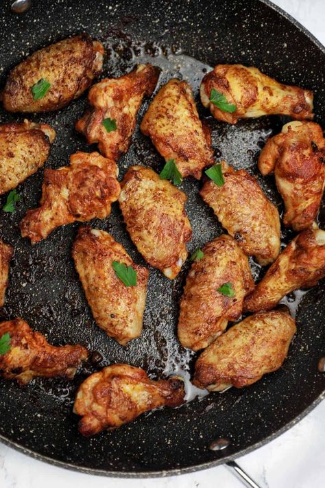 Pan Fried Chicken Wings Recipe | Stove Top Wings - Chicken Vibes Chicken Wings Cast Iron Skillet, Skillet Wings Recipe, Chicken Wings In Pan, Chicken Wings On The Stove Top, Stovetop Chicken Wings Recipe, Pan Fry Chicken Wings, Pan Cooked Chicken Wings, Cast Iron Chicken Wings, Frying Chicken Wings On Stove