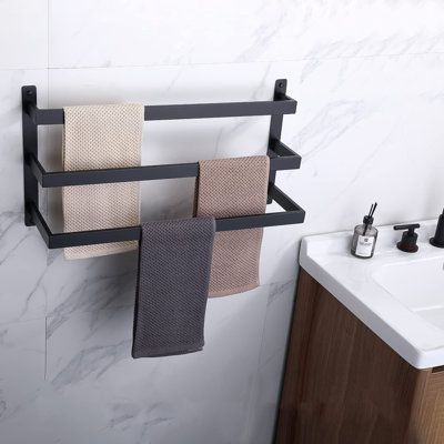 3 Tiers towel bars (Contemporary design) make your bathroom a better collection and interesting look/decoration. Finish: Matte Black | SEGUIRA 3-Tiers Ladder 24.37" Wall Mounted Towel Bar Metal in Black, Size 12.6 H x 6.7 D in | Wayfair WM2GNY Hotel Bath Towels, Black Towel Bar, Hand Towel Rack, Bath Towel Racks, Bath Towel Holder, Towel Ladder, Wall Mounted Towel Rack, Towel Shelf, Towel Holder Bathroom