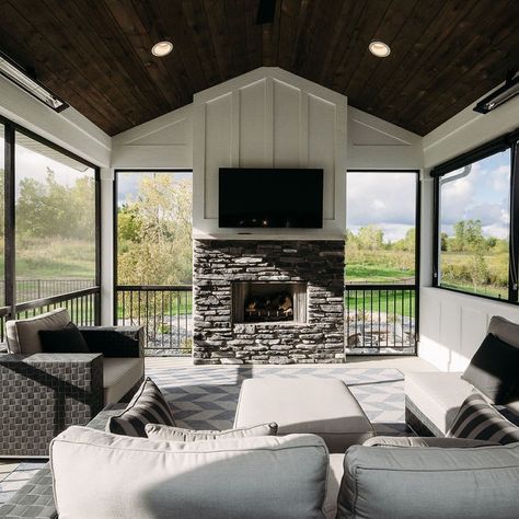 Stone Fireplace With Board And Batten, Board And Batten Outdoor Fireplace, Hot Tub Rooms Indoor, Back Deck Fireplace, Barndominium Screened In Porch, Screened Porch Fireplace Ideas, Outdoor Deck Fireplace, Screened In Porch Fireplace, Porch Fireplace Ideas