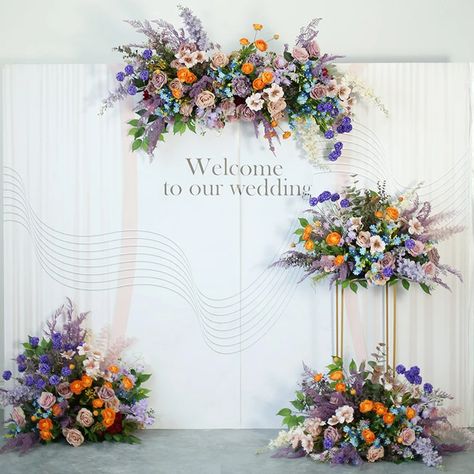 Floral Arch Colorful, Citrus Lavender Wedding, Diy Arch Floral Arrangement, Lilac And Peach Wedding Decor, Lavender And Burnt Orange Wedding, Colorful Wedding Backdrop, Floor Arch Wedding, Lilac And Orange Wedding, Spring Wedding Ideas Colors